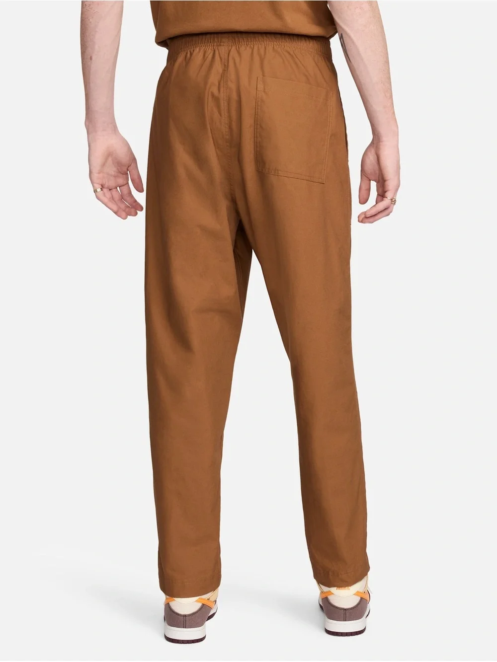 Nike loose fit tapered club pants size S